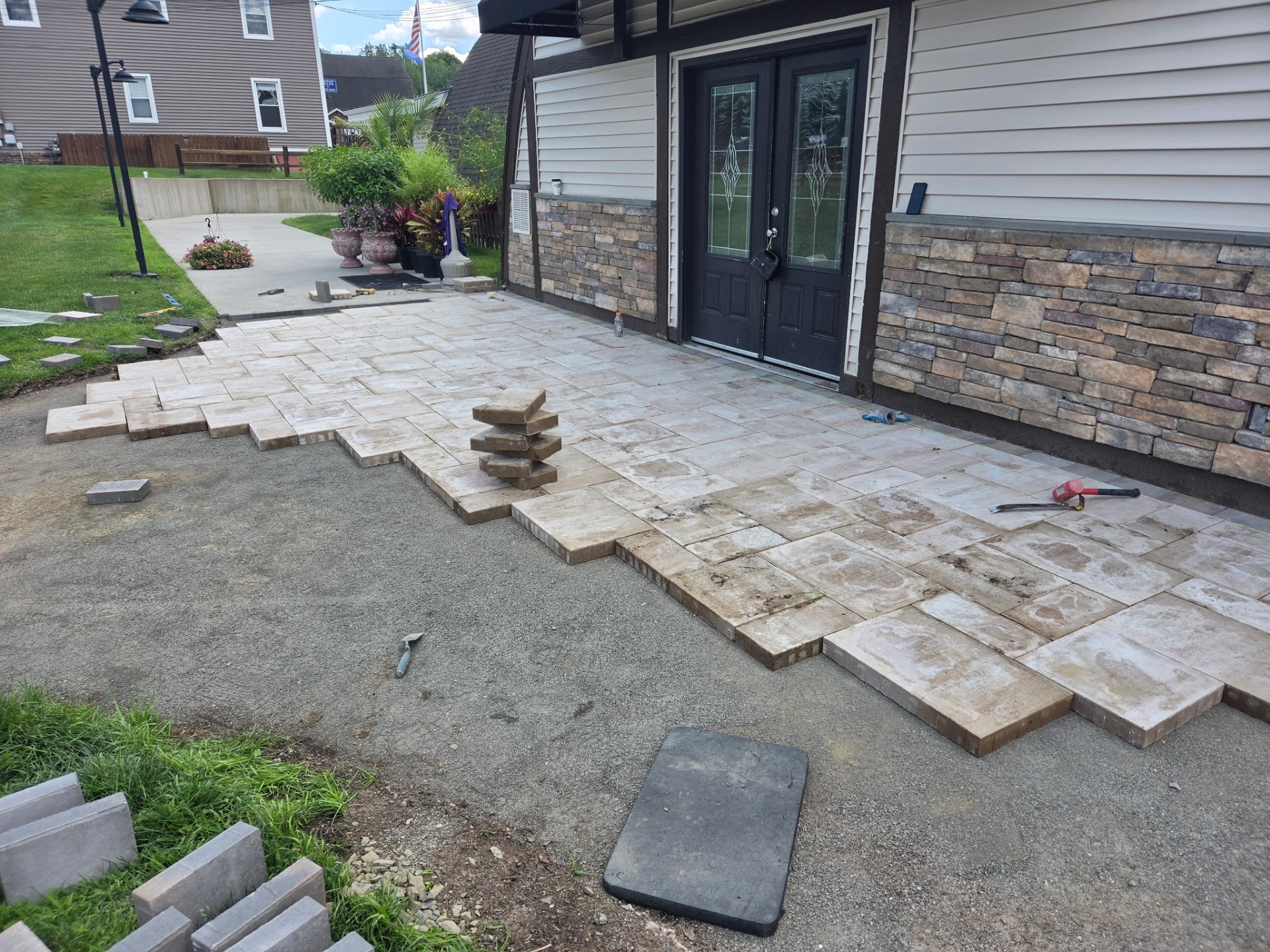 Front entry patio field being laid course by course at Mount Southington, CT