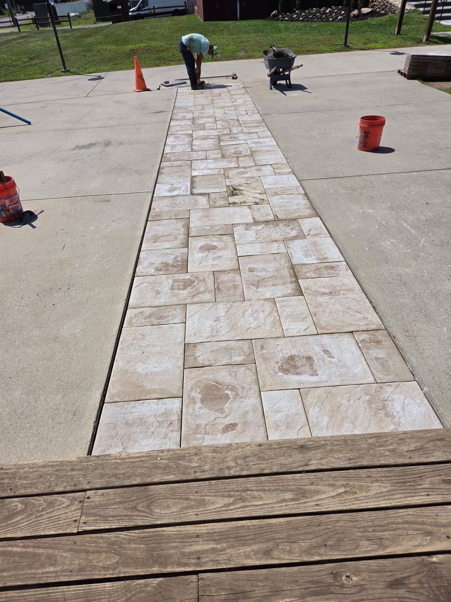 Custom paver walkway inlay between concrete slabs at Mount Southington, CT